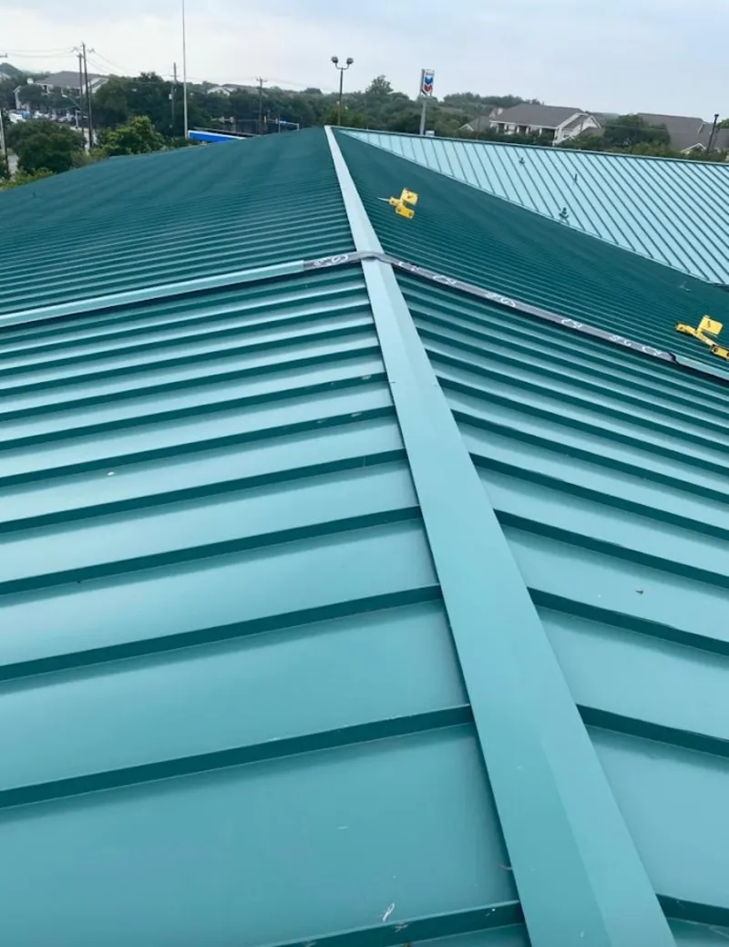 Green commercial metal roof ridge and valley for Metal Roof Repair in Capitol View
